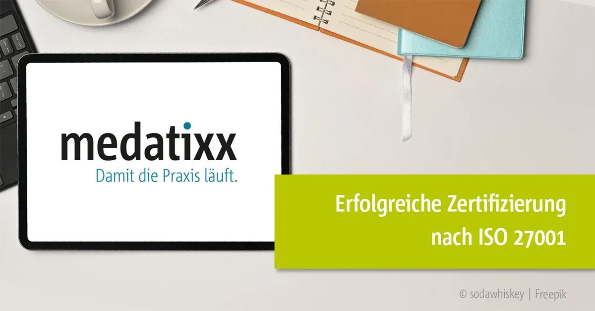Tablet with the medatixx logo on a desk, next to the wording "Successful certification to ISO 27001"